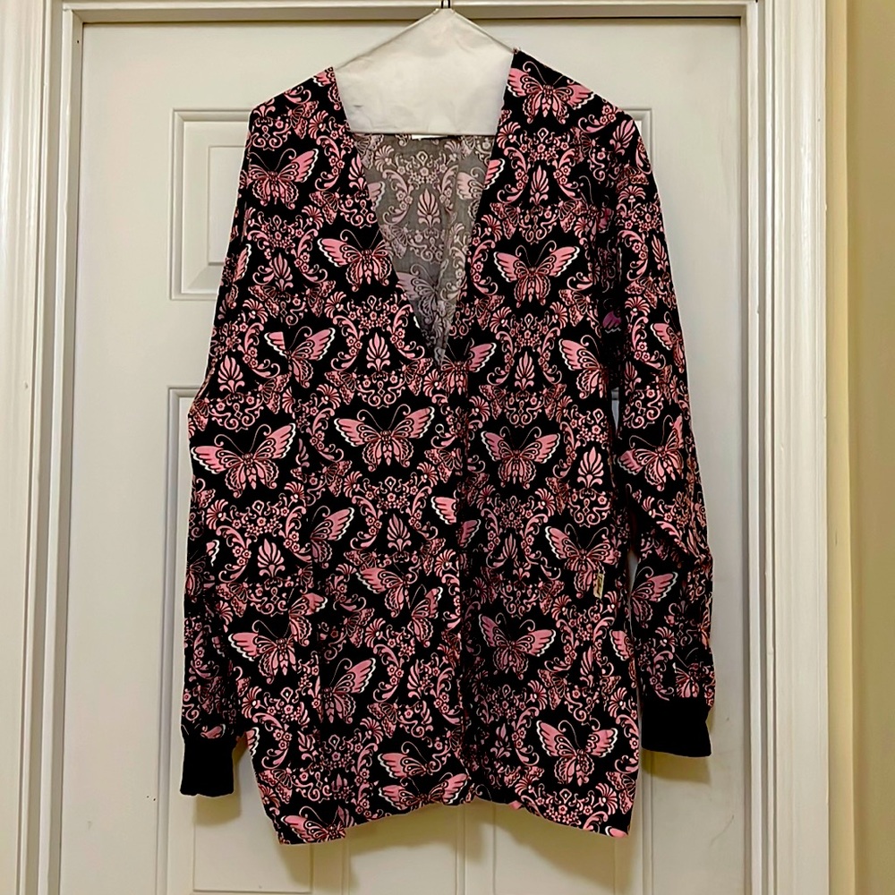 Pretty brown scrub jacket with pretty pink butterflies.